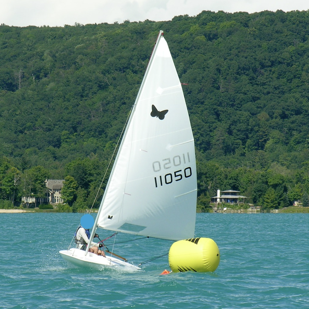 White Mad Butterfly sail at an inland lake