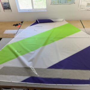Purple, lime green, white Mad Sunfish sail